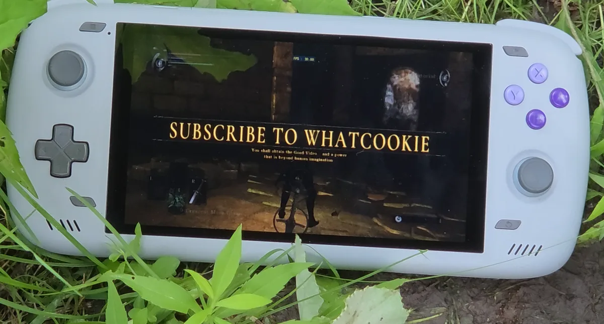 Demon’s Souls displaying “Subscribe to Whatcookie” on an Odin 2 outdoors